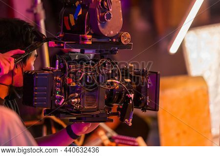 Movie Shooting Or Video Production And Film Crew Team With Camera Equipment. Video Camera Operator W