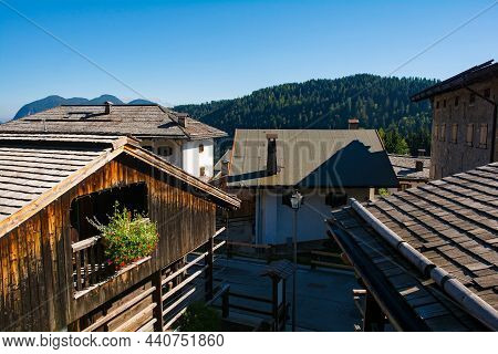 Rooftops Of Traditional Wooden Buildings In The Alpine Village Of Sauris Di Sopra, Udine Province, F