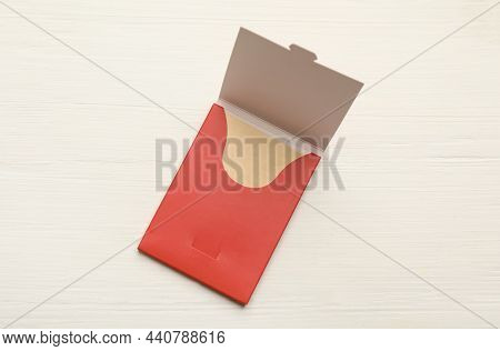 Facial Oil Blotting Tissues On White Wooden Table, Top View. Mattifying Wipes