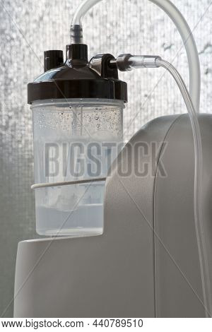 Humidifier Bottle On Home Oxygen Concentrator For Patients Who Need Constant Oxygen While They Are A
