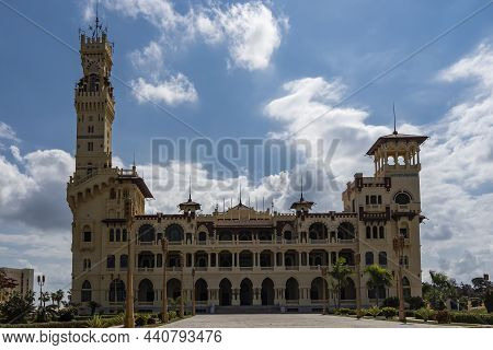 Montazah Royal Palace In The Park Of Alexandria. An Old Stone Building With Towers, Galleries, Colon