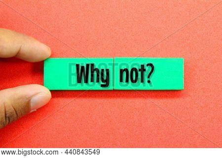 Hands Holding A Colored Board With The Word Why Not Or The Question Why Not