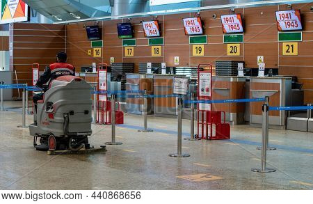 May 11, 2021, Moscow, Russia. A Wedge Service Employee On A Scrubber Drier In The Passenger Terminal