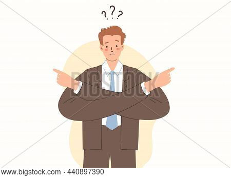 Young Man In A Suit Makes Choice By Pointing Her Hands To The Right And To The Left. Difficult Choic
