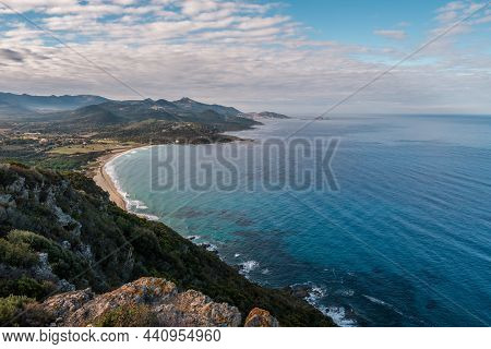 View Over Losari Beach And The Turquoise Mediterranean Sea In The Balagne Region Of Corsica With Ile