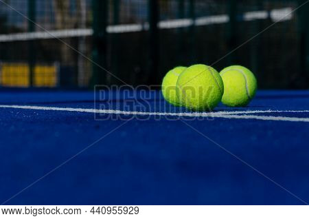 Selective Focus. Three Balls On A Tennis Paddle Court