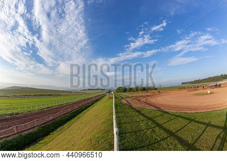 Race Horses Training With Rider Grooms At Dawn Morning Excercise Panoramic Lifestyle Countryside  La
