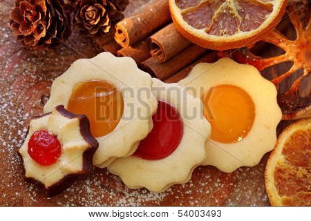 Christmas cakes on brown wooden background