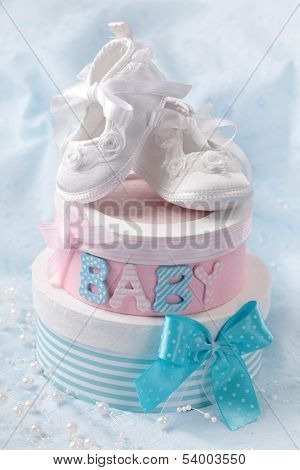 Little baby booties and gift boxes