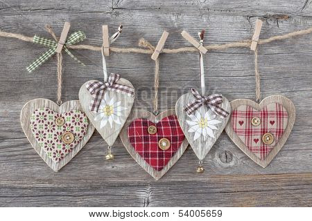 Hearts over a wooden background