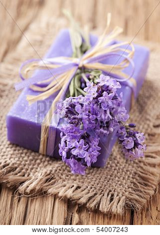 Lavender spa treatment on wooden background