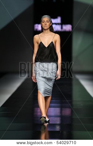 ZAGREB, CROATIA - OCTOBER 17: Fashion model wearing clothes designed by Petra Vuletic and Sasa Hortig on the 'Fashion.hr' show on October 17, 2013 in Zagreb, Croatia.