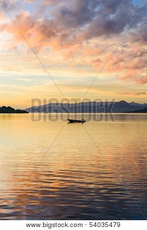Canoe At Sunrise