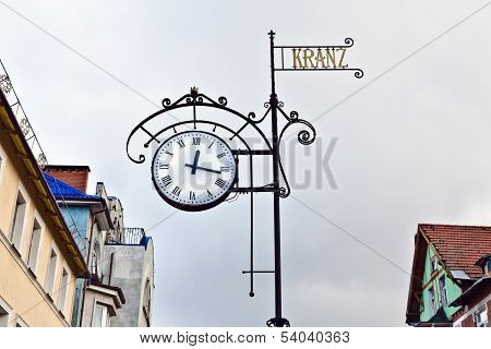 Street Clocks On The Background Of The Roofs Of The Old Houses. Zelenogradsk (until 1946 Cranz)