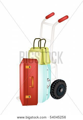 Hand Truck Loading Stack Of Luggages And Bag