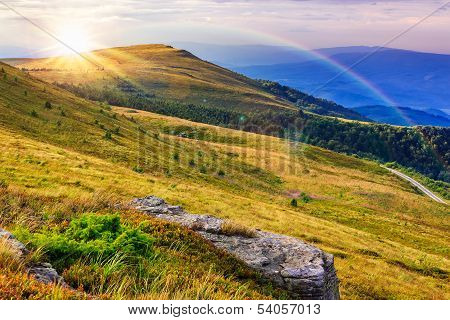 Light On Stone Mountain Slope With Forest