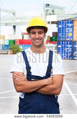 Laughing docker on a seaport