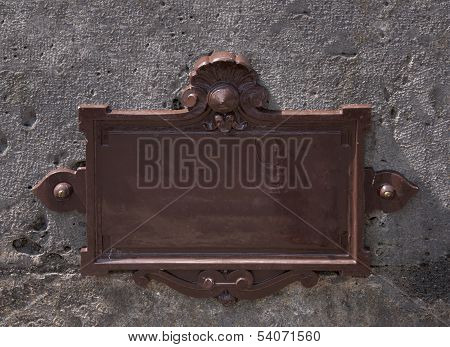 Blank Metal Nameplate On A Wall