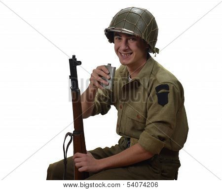 Young American Soldier Takes A Sip Of Alcohol