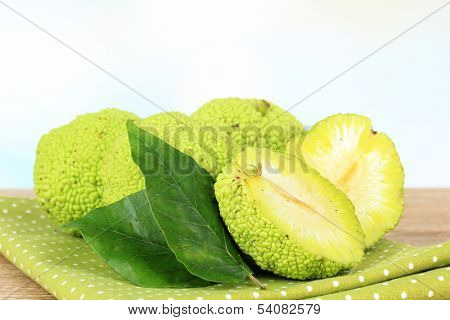 Osage Orange fruits (Maclura pomifera), on wooden table