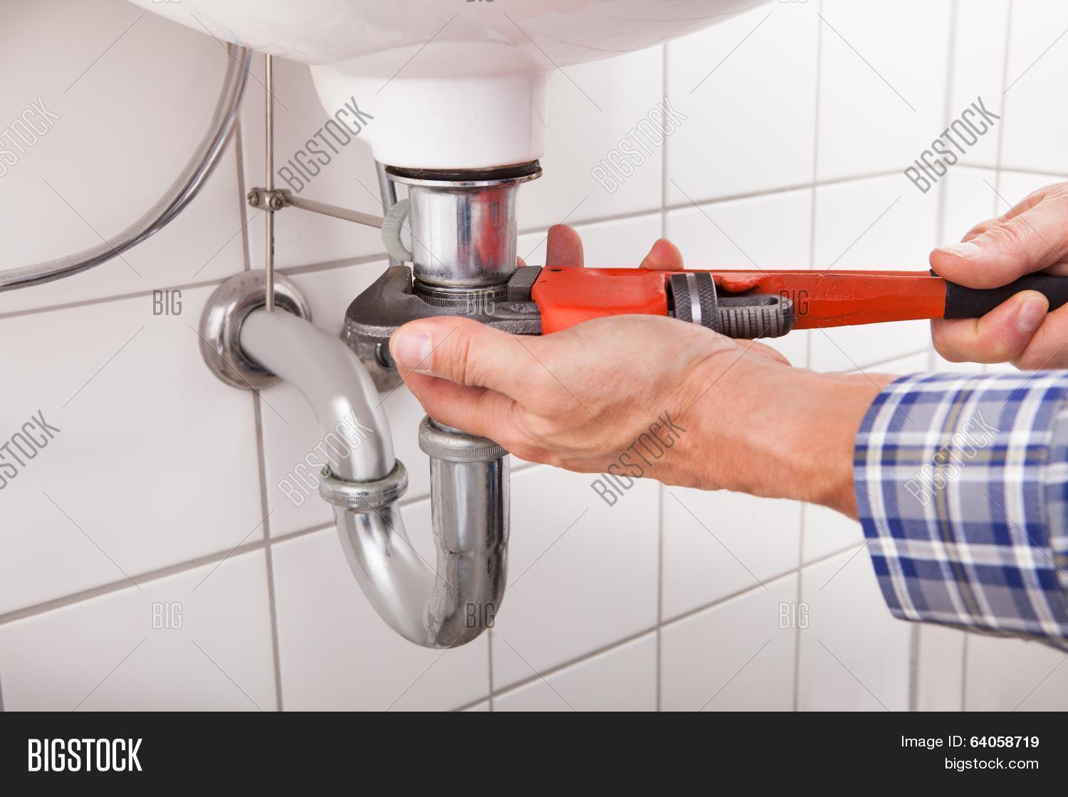 Plumber Fitting Sink Image & Photo (Free Trial) Bigstock