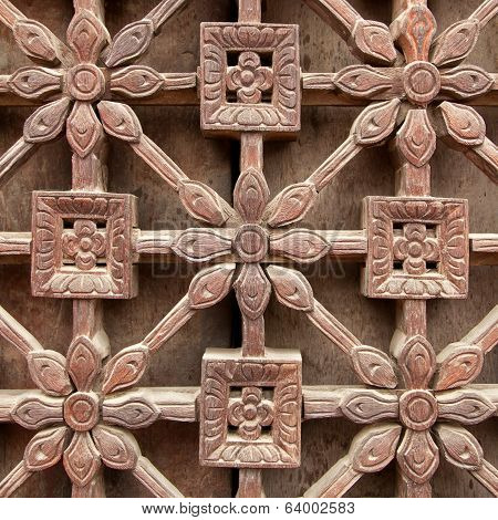 Wooden Flowers In The Latticework