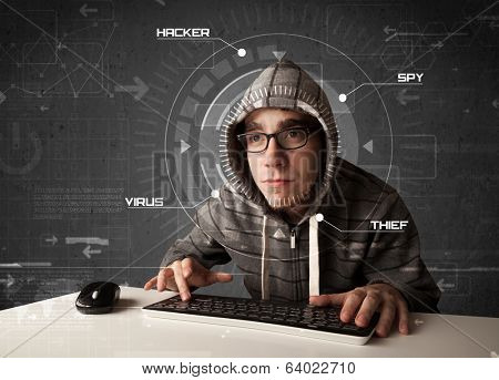 Young hacker in futuristic enviroment hacking personal information on tech background