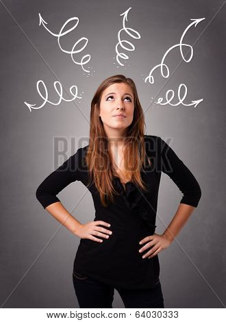 Beautiful young woman thinking with arrows overhead