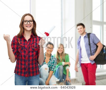 education concept - smiling female student in eyeglasses with diploma