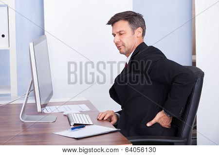 Businessman Suffering From Back Pain