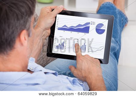 Man Analyzing Graph