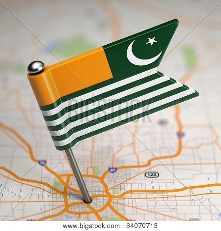Azad Kashmir Small Flag on a Map Background.