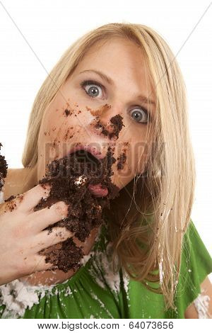 Woman Gree Shirt With Cake Stuff In Mouth
