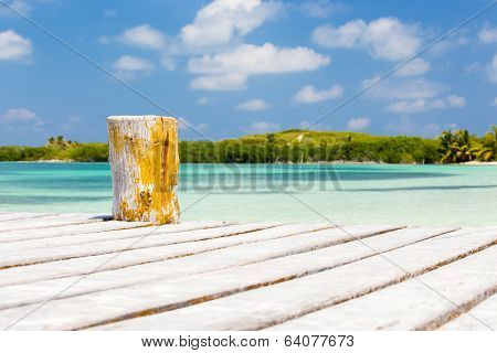 Wooden Pier On Tropical Island
