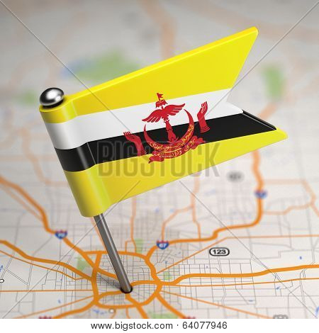 Brunei Small Flag on a Map Background.