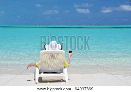 Girl on the beach of Exuma, Bahamas 