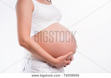 Beautiful pregnant woman on white background