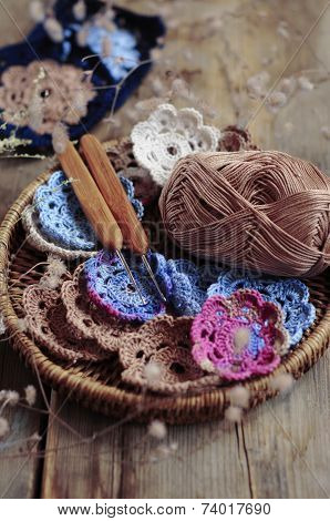 Box Of Yarn And Crocheted Flowers