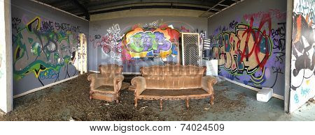 Abandoned Urban Building With Graffiti And Willful Damage. Panorama