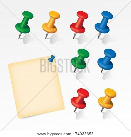 Colorful pins set with paper note