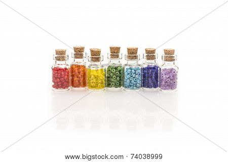 Rainbow Beads In Tiny Glass Bottles