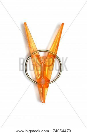 plastic clothespins with metal spring isolated on a white background
