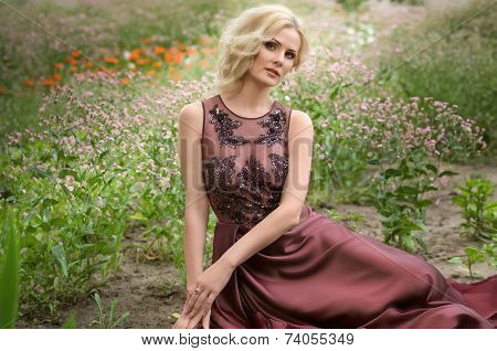 Beautiful woman in spring garden
