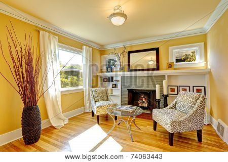 Cozy Sitting Area By The Fireplace