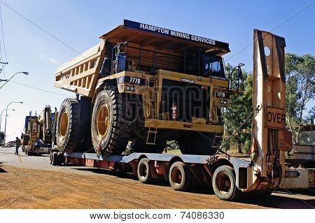 Transporting A Large Dumper Truck On A Road