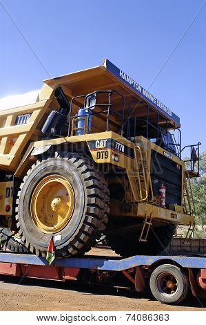 Transporting A Large Dumper Truck On A Road