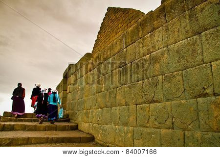 Unidentified tourists visiting Ingapirca important inca ruins in Ecuador