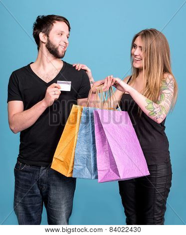 Happy Couple With Shopping Bags