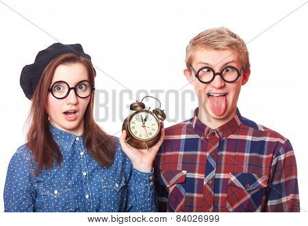 Teen Couple With Clock Alarm.