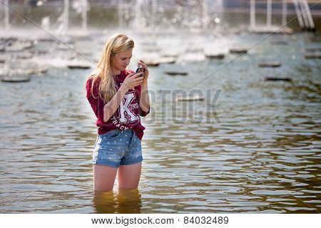 Beautiful Girl Standing In Water